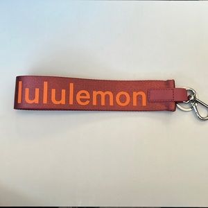 Lululemon Never Lost Keychain Clay and Orange NWOT